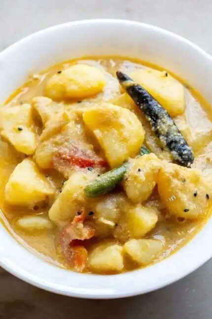 Aloo Posto side dish featuring tender potatoes coated in a nutty poppy-seed paste.