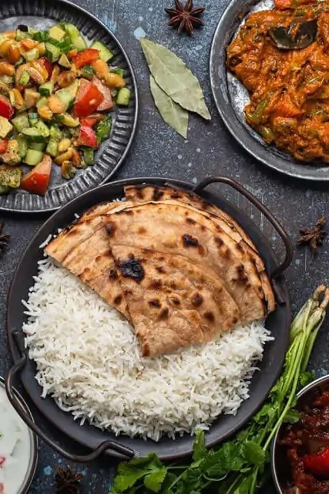 Flaky, golden-brown stuffed Punjabi paratha flatbread served at Zari Indian restaurant.
