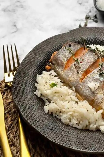 Signature Bengali sea bass fillet cooked in a sweet, smoky tomato sauce at Zari Crawley.