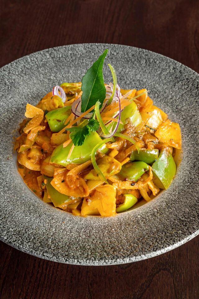 Crispy golden fried Amritsari fish nuggets served with fresh lime and sliced green chillies.
