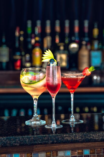 An elegant lineup of bottomless brunch cocktails and prosecco options on the bar counter.