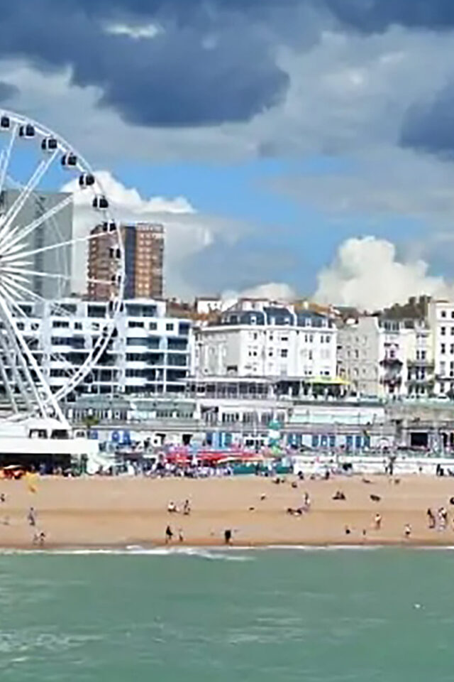 Brighton beach and Ferris wheel on a sunny May Bank Holiday near Zari Restaurant Crawley.