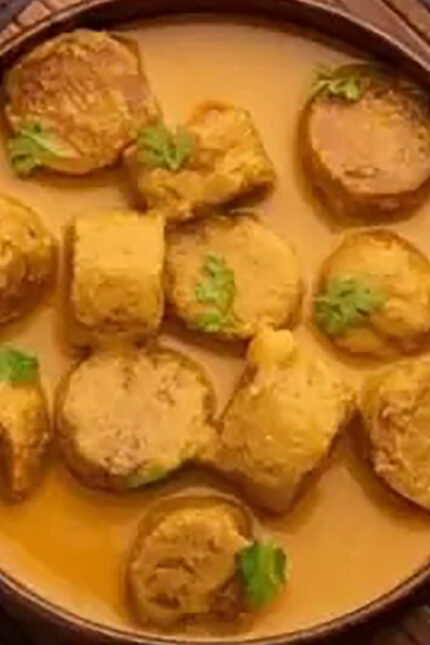 Traditional Rajasthani Gatte ki Sabzi gram flour dumpling curry at Zari Restaurant in Crawley.