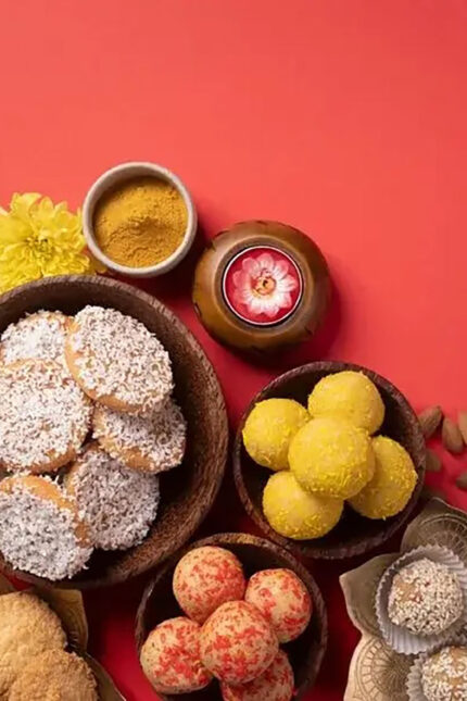 An assortment of colorful traditional Indian sweets and ladoo at Zari Crawley.