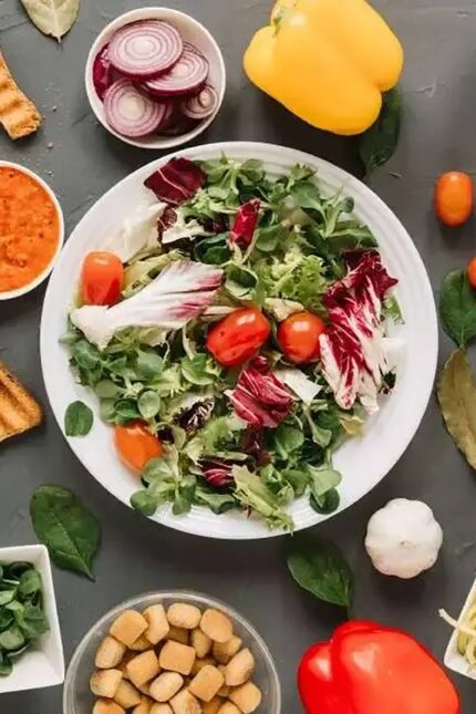 A spread of vibrant plant-based Indian dishes served on a table at Zari Restaurant near Brighton.