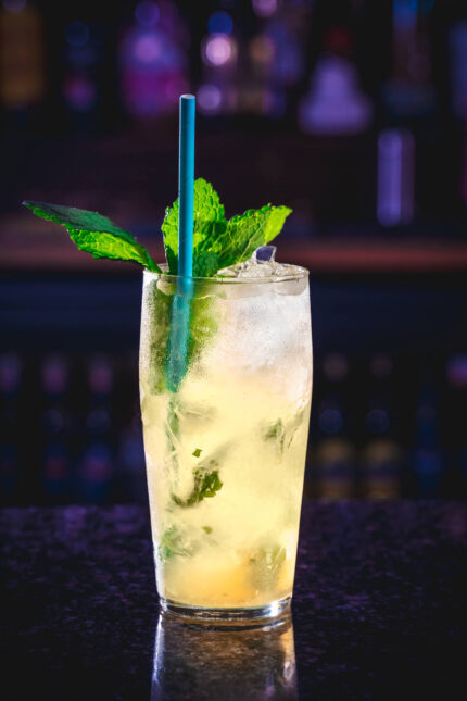 Chilled mint and lime mojito cocktail garnish with fresh herbs at Zari Restaurant.
