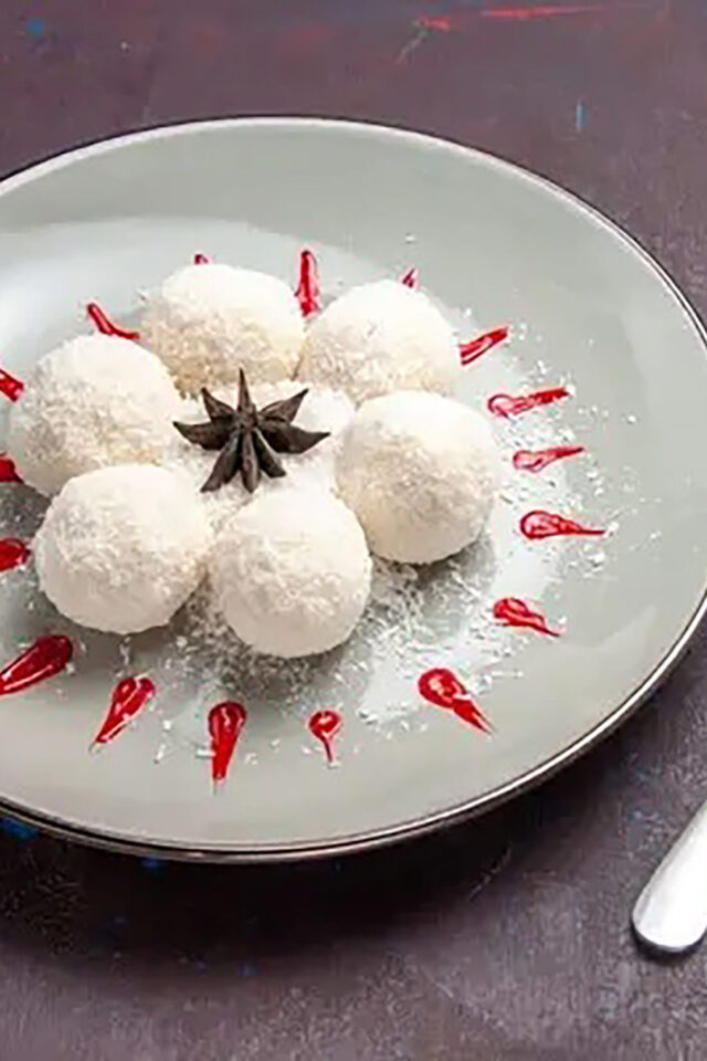 Sweet syrup-filled Rasgulla dumplings served at Zari Indian Restaurant in Crawley.