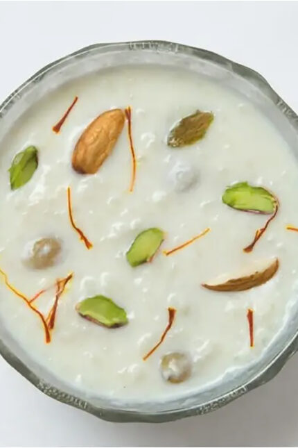 Traditional Rice Kheer pudding topped with nuts and rose petals at Zari Crawley.